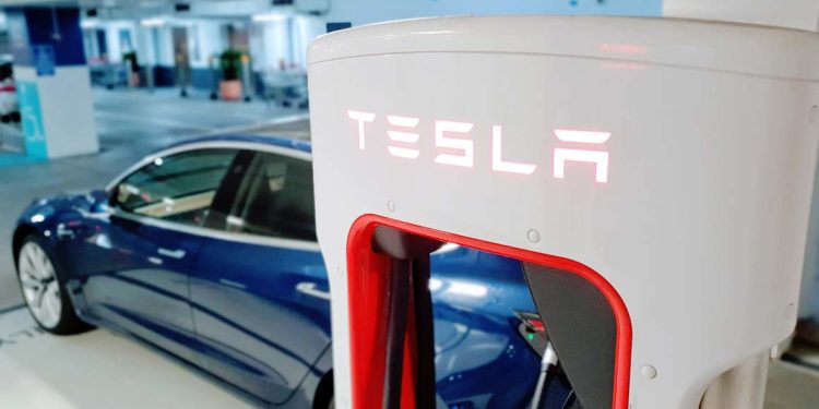 Tesla Reports 55% Profit Decline, Cites Pressure on EV Sales from Hybrids